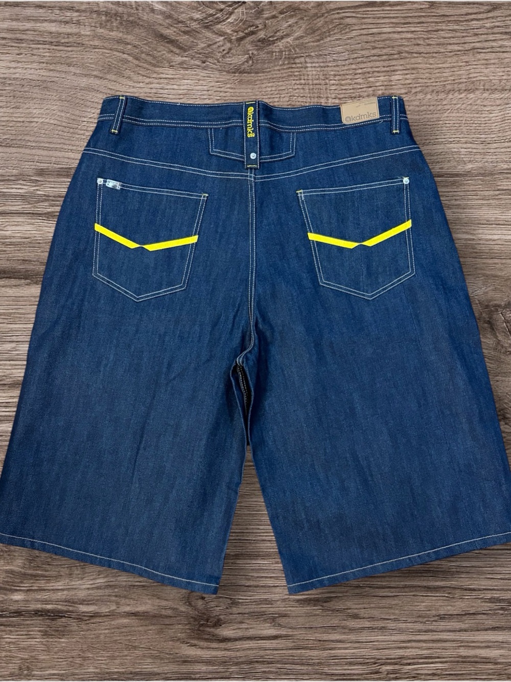 Akademiks Men's Dark Blue Denim Shorts with Yellow Pocket Accent
